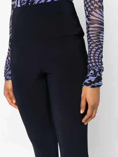 Shop Norma Kamali High-rise Flared Trousers In Blau