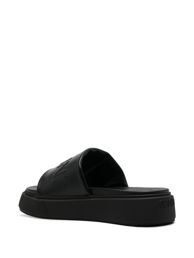 Ganni Logo-embossed Vegan Leather Platform Slides In Schwarz
