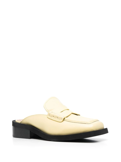 Shop Ganni Square-toe Backless Loafers In Gelb