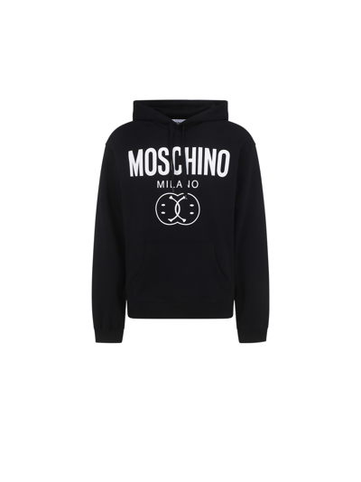 Shop Moschino Hoodie In Black/white