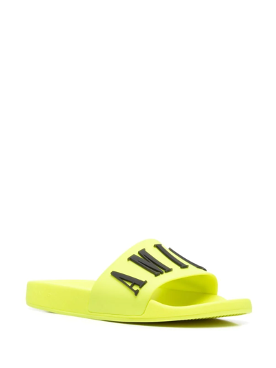 Amiri Logo-embossed Rubber Slides In Yellow
