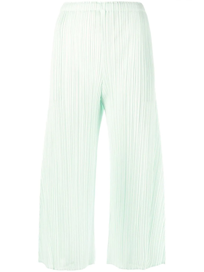 Shop Issey Miyake May Plissé Cropped Trousers In Green