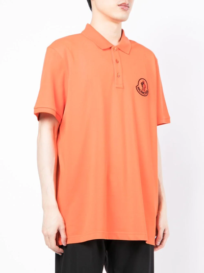 Shop Moncler Logo-embroidered Polo Shirt In Orange