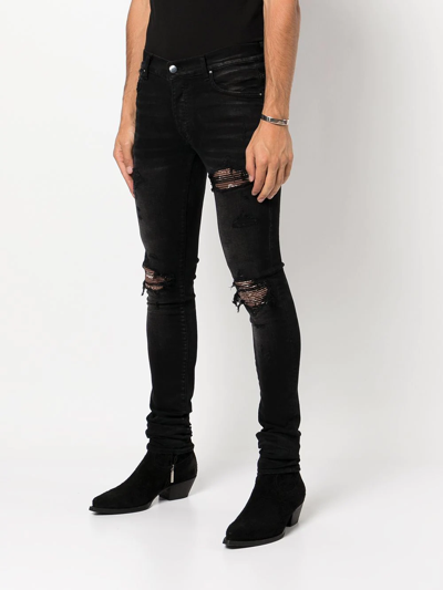 Shop Amiri Paisley-patch Distressed Skinny Jeans In Black