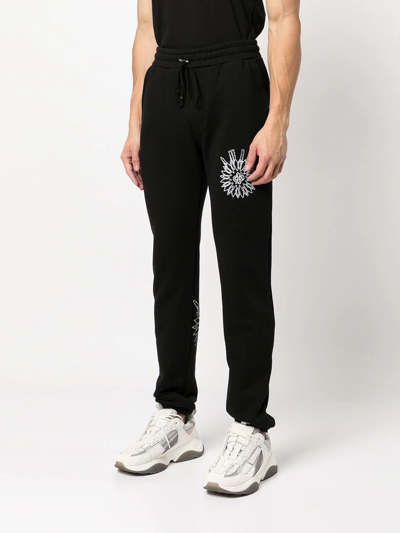 Amiri Slim-cut Logo-print Track Pants In Black