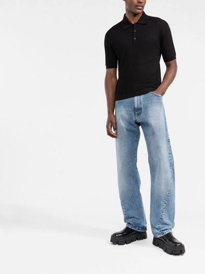 Shop Versace Twisted Seam Denim Jeans In Blue