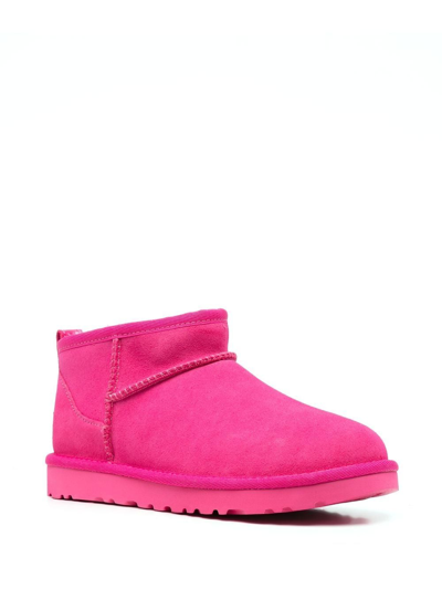 Shop Ugg Ultra Mini Shearling Boots In Pink