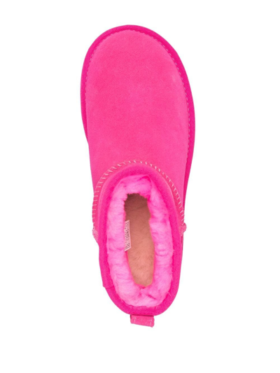 Shop Ugg Ultra Mini Shearling Boots In Pink