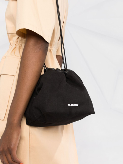 Jil Sander Logo Drawstring Shoulder Bag In Black