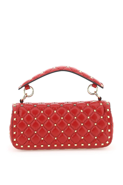 Shop Valentino Rockstud Spike Handbag In Red