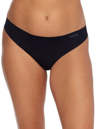 Shop Calvin Klein Invisibles Thong 3-pack In Satellite Assorted