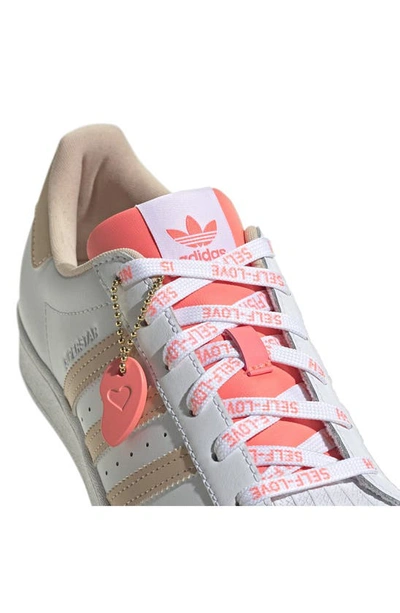 Shop Adidas Originals Superstar Sneaker In White/ Halo Blush/ Acid Red