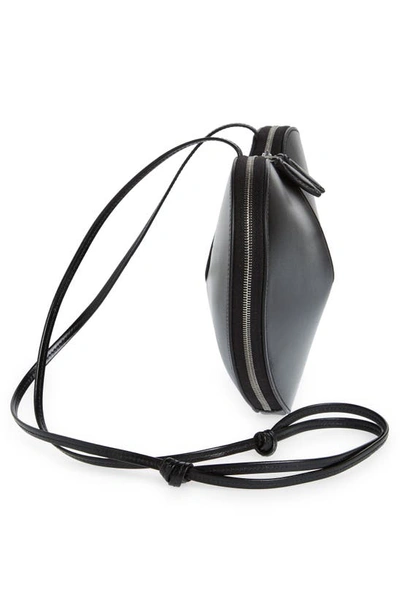 Shop Alaïa Le Coeur Leather Crossbody Bag In 999 - Noir