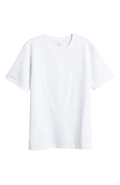 Shop Alo Yoga Conquer Reform Performance Crewneck T-shirt In White