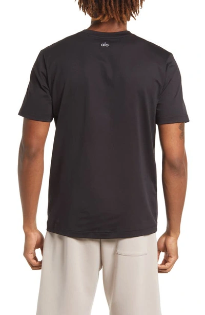 Shop Alo Yoga Conquer Reform Performance Crewneck T-shirt In Black