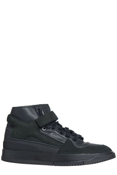 Shop Adidas Originals Logo Embossed Panelled High Top Sneakers In Black