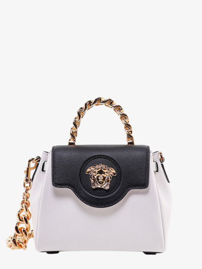 Shop Versace Handbag In White