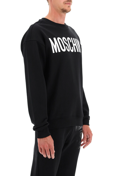 Shop Moschino Logo Print Sweatshirt In Black,white