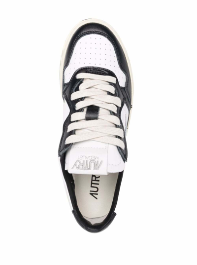 Shop Autry White And Black Low-top Sneakers In Leather  Woman