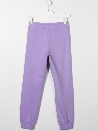 Shop Tommy Hilfiger Junior Teen Logo Print Track Pants In Purple
