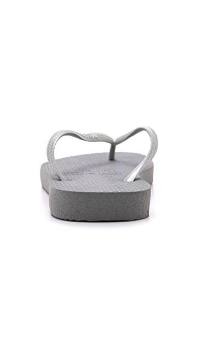 Shop Havaianas Slim Flip Flops In Grey/silver