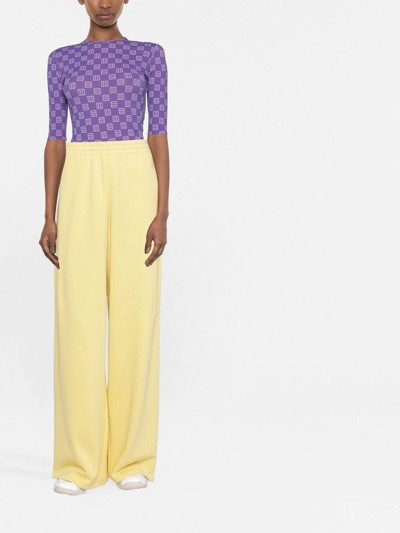Shop Moncler Wide-leg Track Pants In Yellow