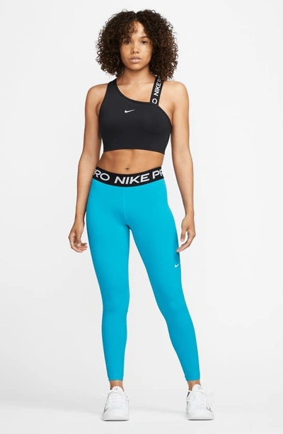 Shop Nike Pro Mid Rise Leggings In Laser Blue/ Black/ White
