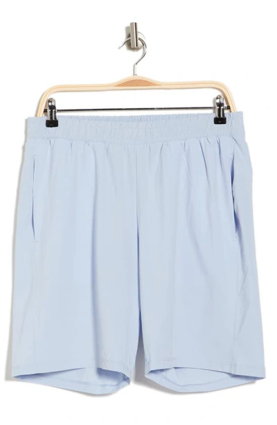 Shop Z By Zella Traverse Woven Shorts In Blue Zen