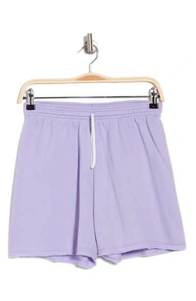 Shop Bella+canvas Cutoff Sweat Shorts In Dark Lavender