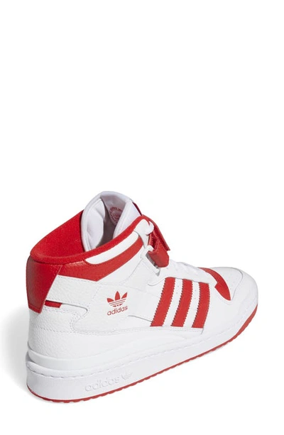 Shop Adidas Originals Forum Mid Sneaker In White/ Red