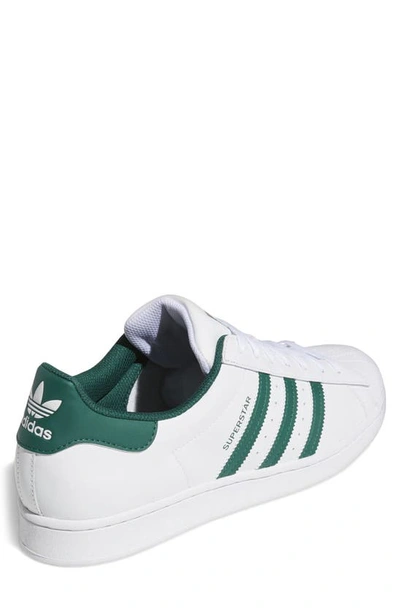 Shop Adidas Originals Superstar Sneaker In White/ Green