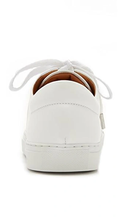 Shop Carven Leather Sneakers In White