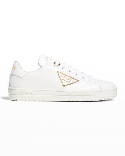 Shop Prada Downtown Leather Tonal Sneakers With Metal Logo In White