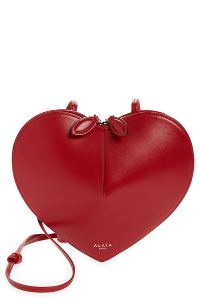 Shop Alaïa Le Coeur Leather Crossbody Bag In 331 - Laque