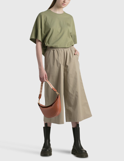 Shop Loewe Cropped Trousers In Brown