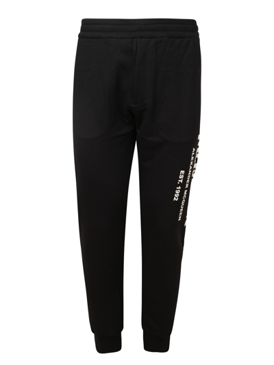 Shop Alexander Mcqueen Logo Track Trousers In Black