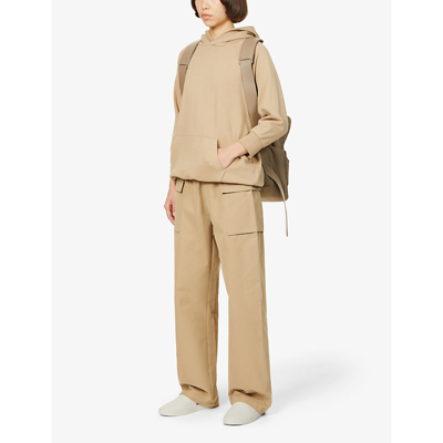 Shop Essentials Cargo Relaxed-fit High-rise Cotton-blend Trousers In Oak