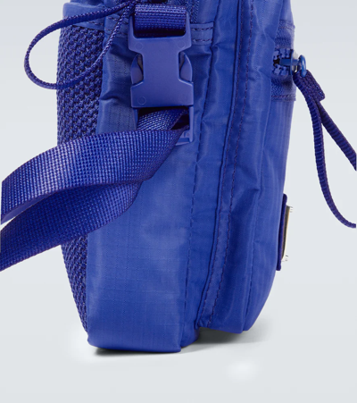 Shop Acne Studios Face Ripstop Crossbody Bag In Blue