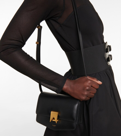 Shop Alaïa Le Papa Small Leather Crossbody Bag In Black