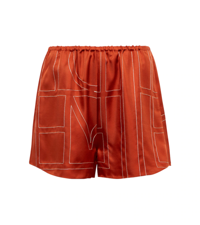 Shop Totême Logo-embroidered Silk Shorts In Bloody Mary