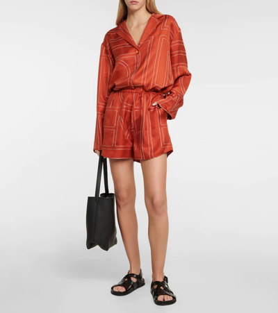 Shop Totême Logo-embroidered Silk Shorts In Bloody Mary