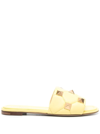 Shop Valentino Roman Stud Flat Sandals In Gelb