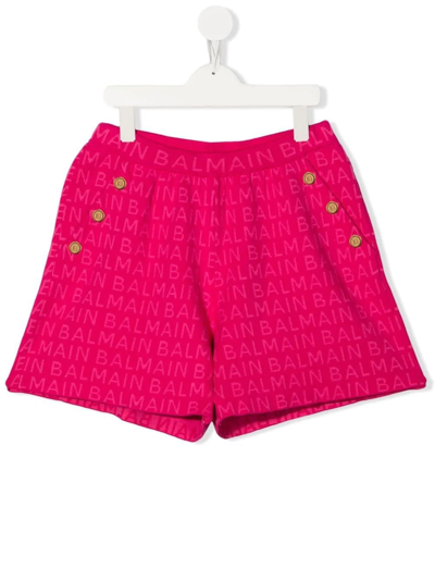 Shop Balmain Kids Fuchsia Shorts With All-over Logo In Fucsia