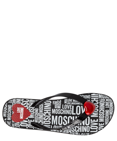 Shop Love Moschino Flip Flops In Black