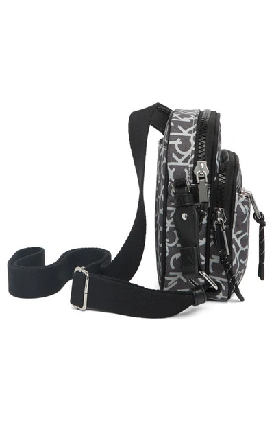 Shop Calvin Klein Evie Crossbody Bag In Black Silv