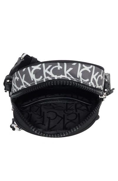 Shop Calvin Klein Evie Crossbody Bag In Black Silv