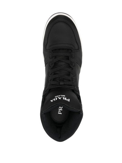 Shop Prada Logo-plaque Mid-top Sneakers In Black