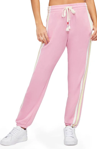 Pink joggers with white stripe top
