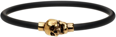 Shop Alexander Mcqueen Black Cord Skull Bracelet In 8565 Natural/a.gold