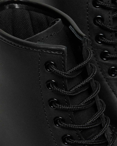 Dr. Martens' 1460 Slip Resistant Leather Lace Up Boots In Black